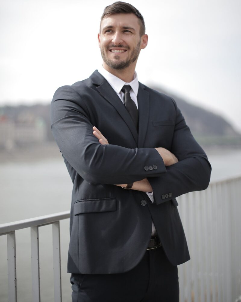 Team member in business attire ready for an interview outside the office