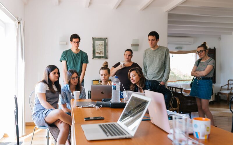 Group of team members taking part in a leadership development workshop